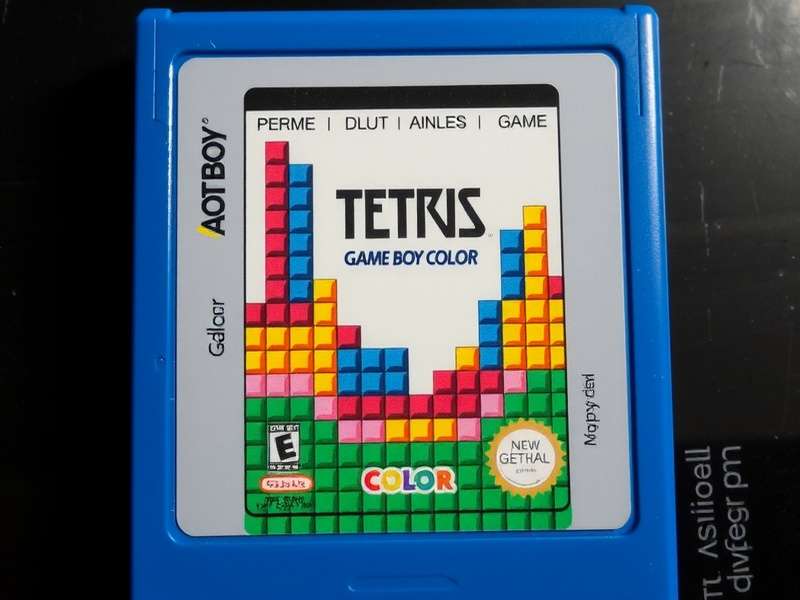 Close-up photograph of a genuine Tetris GameBoy Color cartridge, showing the label and Nintendo seal